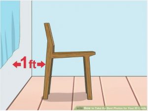 A chair is pictured one foot from a wall