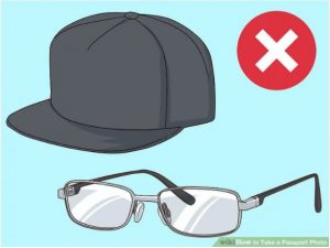 An illustration of a hat, glasses and a no symbol